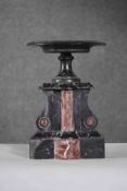 A 19th century French black and red veined marble clock garniture piece of architectural design. H.