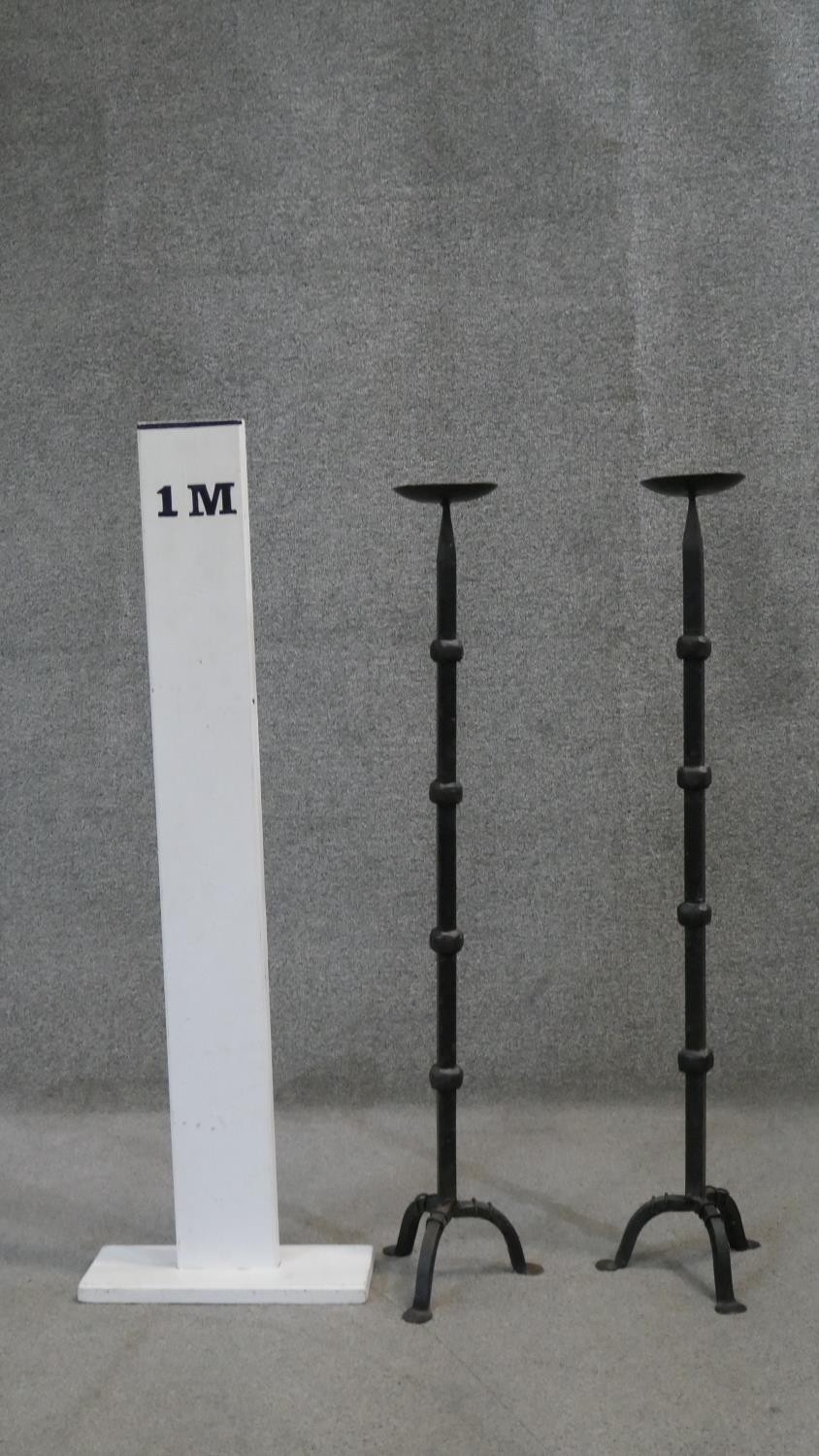 A pair of Gothic style cast iron tripod leg floor standing pricket candlesticks. H.91 W.21 cm - Image 4 of 4