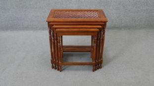 A nest of four Eastern hardwood brass inlaid graduating occasional tables. H.53 W.54 D.34 cm