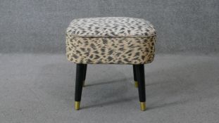 A 1960's vintage stool in original vinyl upholstery with fitted sewing box interior. H.34 W.39 D.