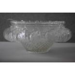 A large vintage pressed clear glass punch bowl with fifteen cups and ladle. H.22 Diameter.46cm.