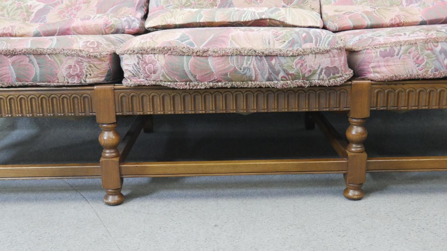 A vintage carved oak three seater sofa in the country antique style with fitted floral cushions. H. - Image 5 of 7