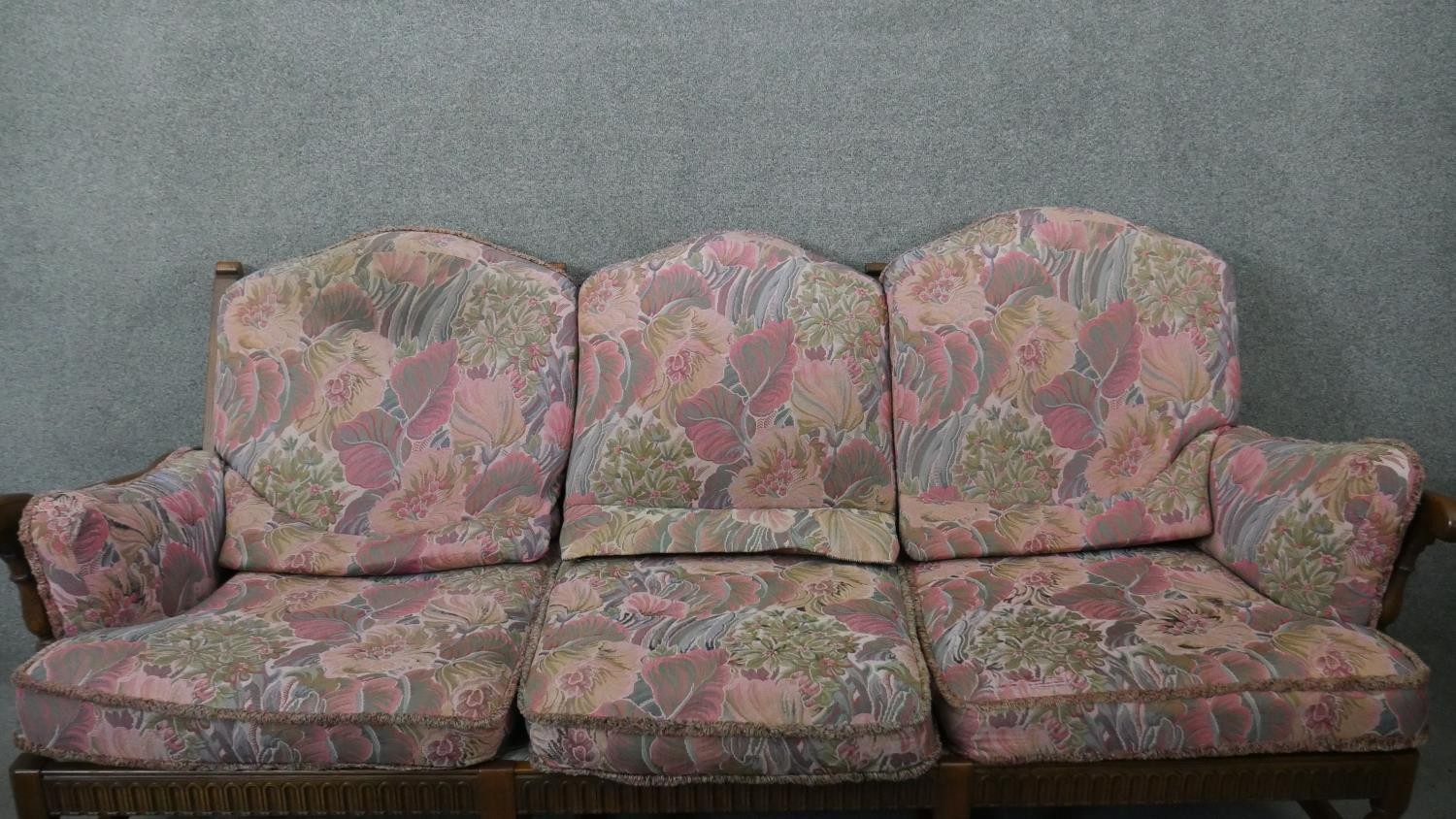 A vintage carved oak three seater sofa in the country antique style with fitted floral cushions. H. - Image 4 of 7