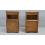 A pair of mid century walnut Art Deco style bedside cabinets. H.60 W.37 D.28 cm