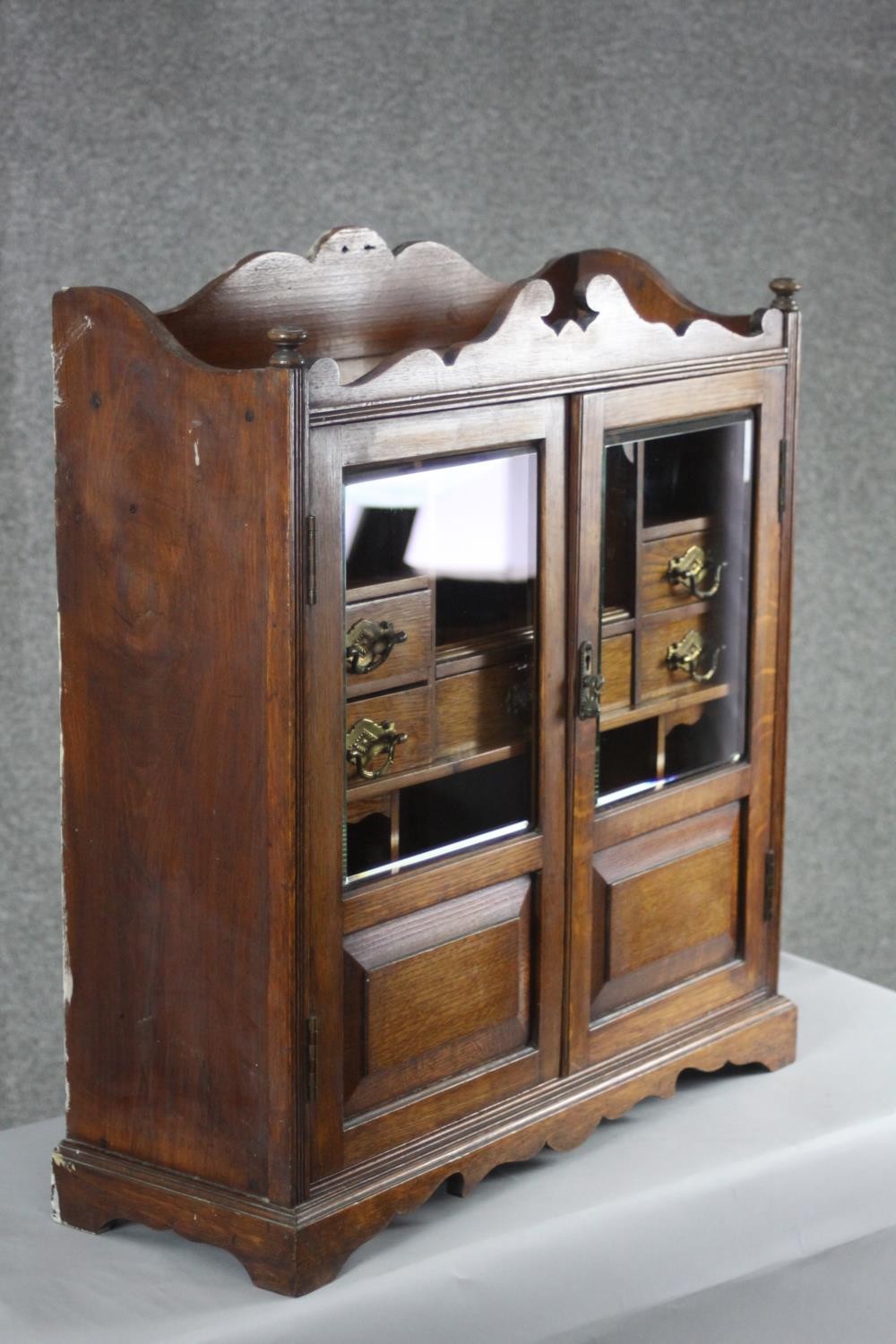 A 19th century oak table cabinet with glazed doors enclosing fitted interior on shaped bracket feet. - Image 2 of 8