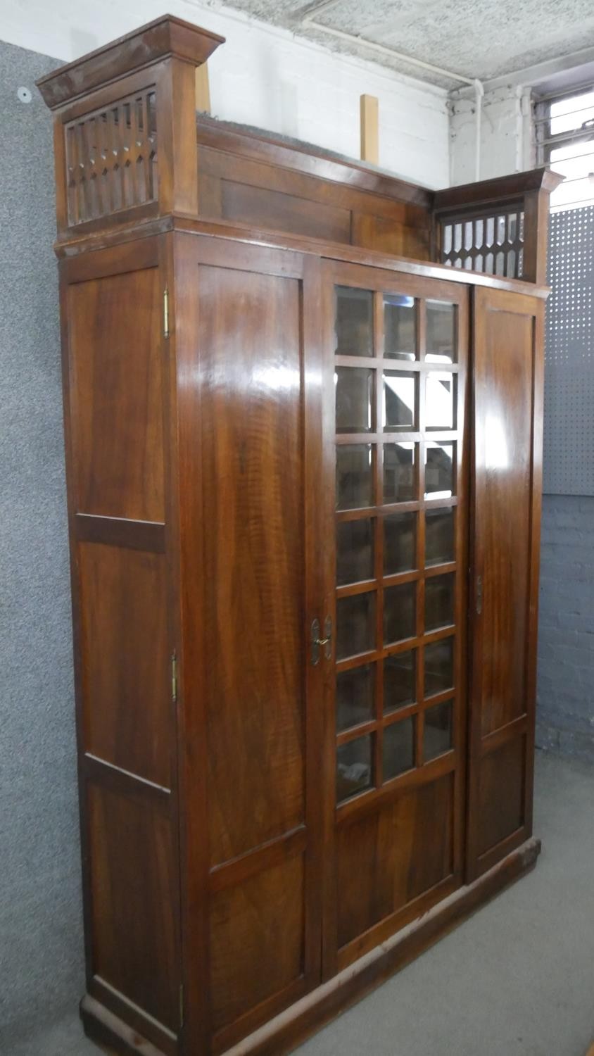 A late 19th century walnut Arts and Crafts Glasgow School bookcase with pierced and panelled - Image 6 of 8