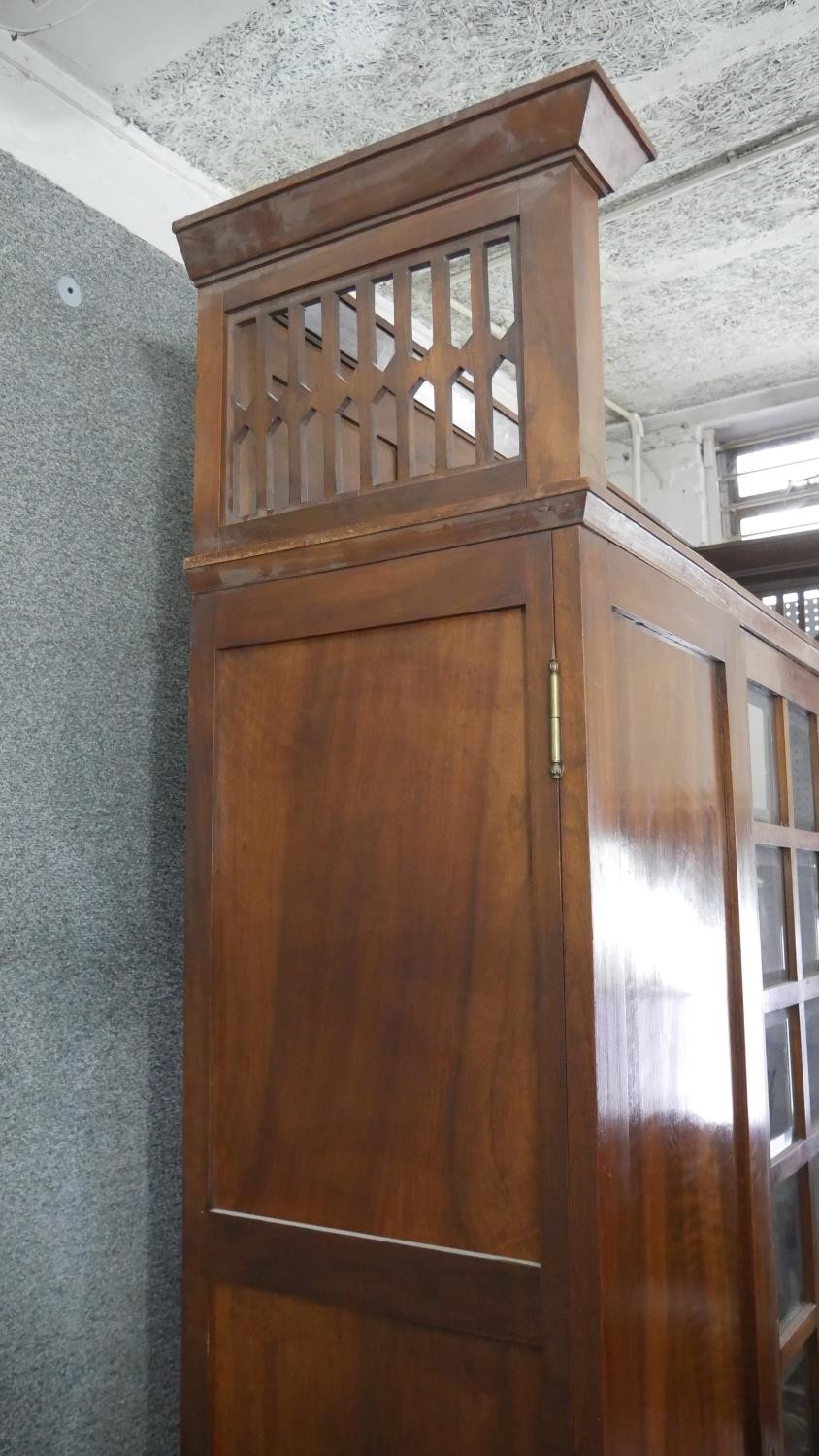 A late 19th century walnut Arts and Crafts Glasgow School bookcase with pierced and panelled - Image 5 of 8