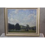 Ethel Louise Rawlins- A framed oil on canvas 'Downs at Hurst' Sussex, signed and inscribed verso.