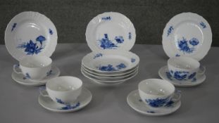 A Royal Copenhagen hand painted porcelain blue and white floral design part four person tea set.