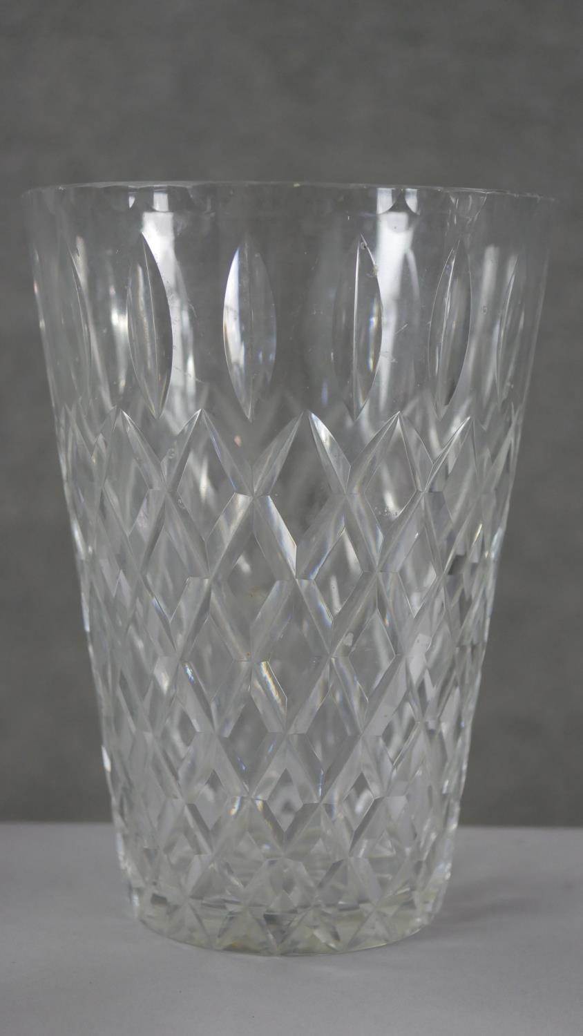 A collection of four cut crystal flower vases with stylised foliate design. H.20 Diam.15cm (largest) - Image 6 of 8