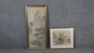 Two framed and glazed 19th century Japanese ink studies. One of a mountain landscape with temple and