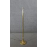 A vintage brass standard lamp with fluted column design and circular base. H.144 Diam.27CM