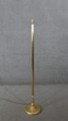 A vintage brass standard lamp with fluted column design and circular base. H.144 Diam.27CM