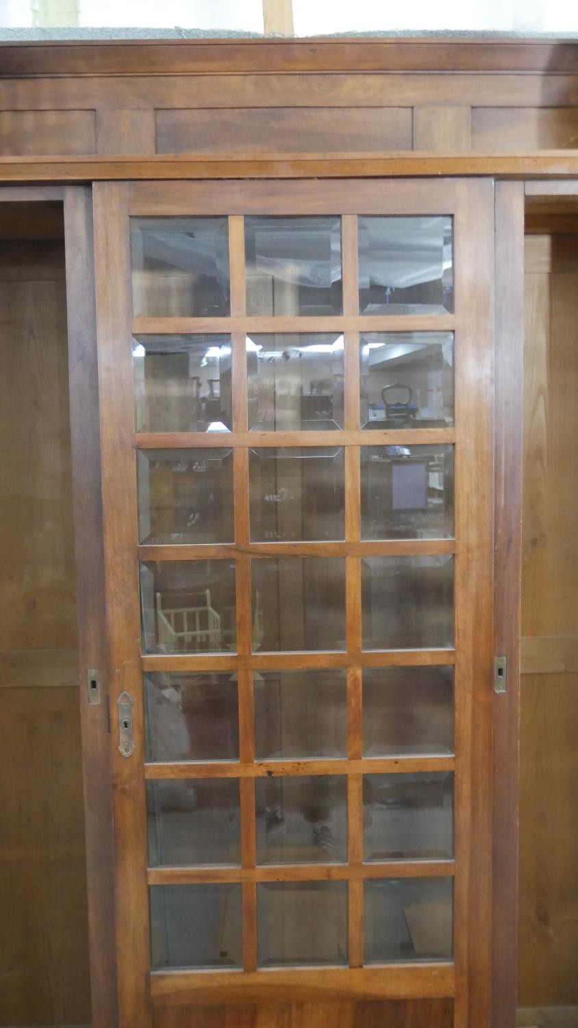A late 19th century walnut Arts and Crafts Glasgow School bookcase with pierced and panelled - Image 3 of 8