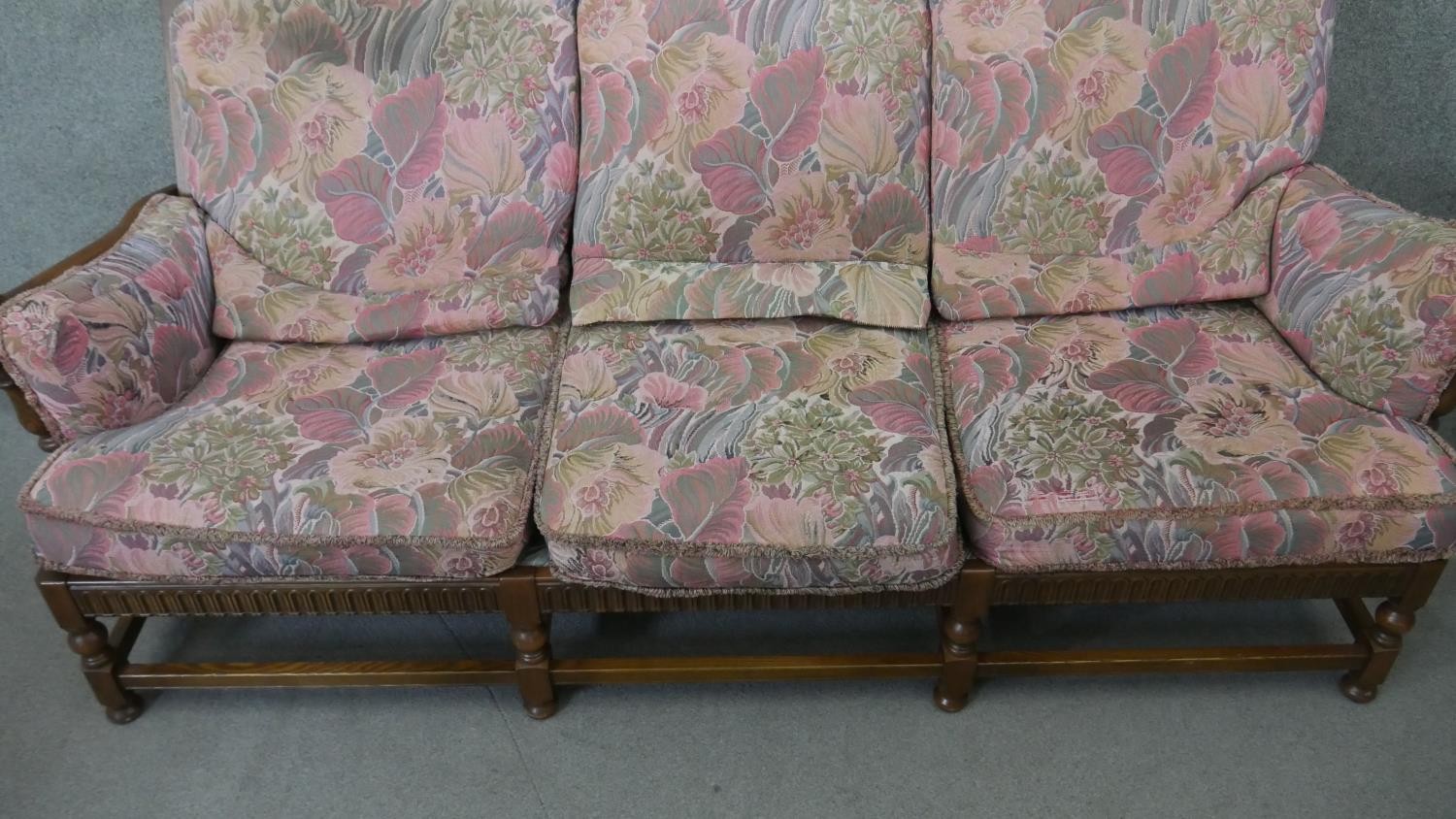 A vintage carved oak three seater sofa in the country antique style with fitted floral cushions. H. - Image 3 of 7