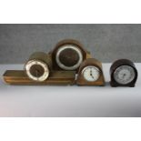 Four vintage teak and bakelite mantle clocks. Two by Smiths and one by Timco. H.20 W.26 cm. (