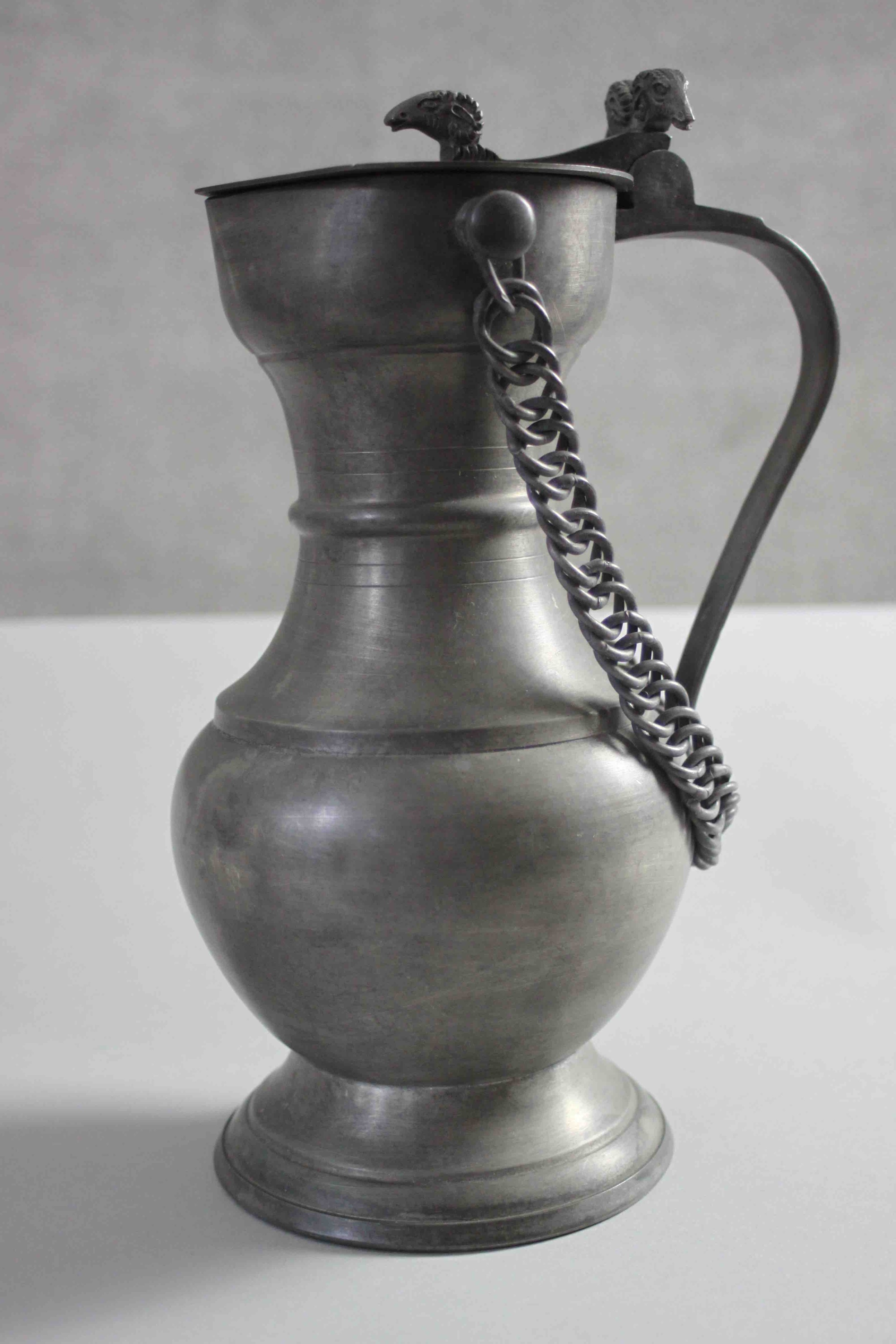 A large 18th century style lidded pewter tankard with rams head detailing along with a silver plated - Image 3 of 11