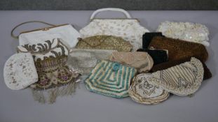 A collection of sixteen early 20th century beaded and embroidered clutch and evening bags. One