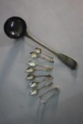 A French silver soup ladle along with a set of Rococo design silver coffee spoons and sugar tongs.