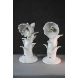A pair of vintage white glaze ceramic wall mounted floral design lamps. (repairs as can be seen).