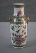 A Chinese early 20th century famille rose hand painted porcelain vase. One side decorated with birds