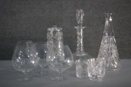 A collection of cut crystal. Including four brandy goblets, a Victorian cut crystal decanter with