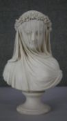 A 19th century Copeland Parian bust of 'The Veiled Bride', modelled by Raffaele Monti, her head