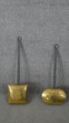 Two Victorian brass and cast iron chestnut roasters. H.53 W.15 D.4cm