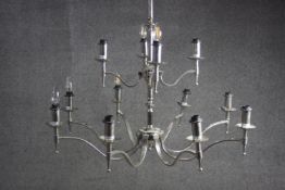 A contemporary twelve branch chrome chandelier. H.70 Diameter. 95cm.