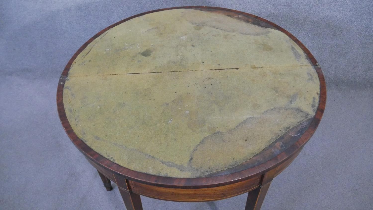 A Georgian mahogany demi lune fold over top card table with satinwood line inlay and gateleg - Image 4 of 4