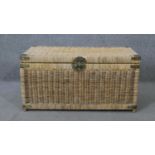 A Chinese wicker chest with central partition and engraved brass fittings. H.41 W.81 D.41cm