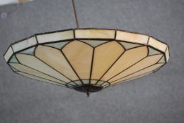 A vintage Tiffany style leaded stained glass fan design conical pendant uplighter with four bulb