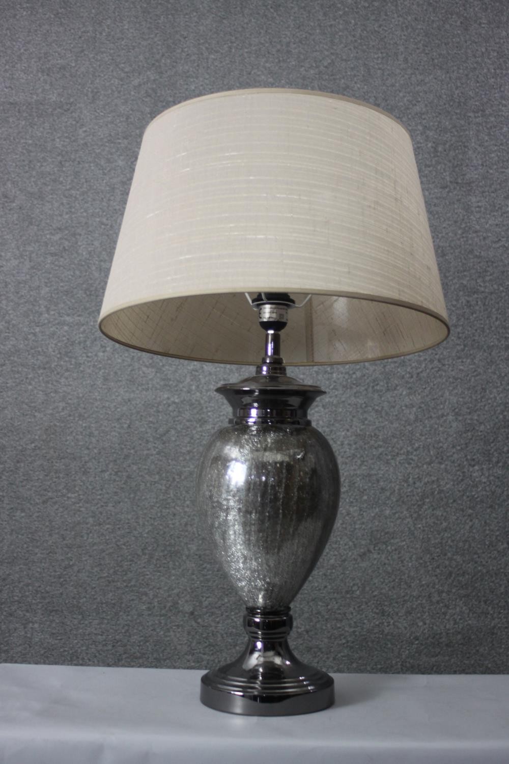 A pair of crackle mirrored grey glass urn design table lamps with cream shades. H.74 Diameter 18 cm. - Image 2 of 6