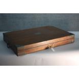 A 19th century oak tray case with brass banding and cartouche with blue velvet lining. H.51 W.72 D.