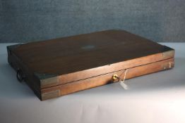 A 19th century oak tray case with brass banding and cartouche with blue velvet lining. H.51 W.72 D.