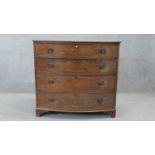 A 19th century mahogany bow fronted chest of drawers on bracket feet. H.101 W.108 D.54 cm