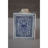 A 19th century Chinese blue and white porcelain rectangular tea caddy with hand painted floral