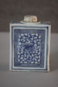 A 19th century Chinese blue and white porcelain rectangular tea caddy with hand painted floral