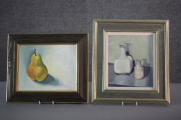 Two framed still life oils on canvas. One of a pear signed Annie P and one of two bottles, unsigned.