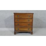 A 19th century mahogany Georgian style small chest of four drawers on shaped bracket feet. H.70 W.62