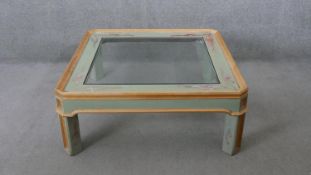 A contemporary painted and light oak coffee table with inset plate glass top. H.43 W.107 D.107CM