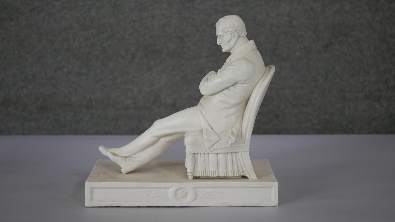 A 19th century Coalbrookdale Parian figure, Duke of Wellington, full-length, seated, after George