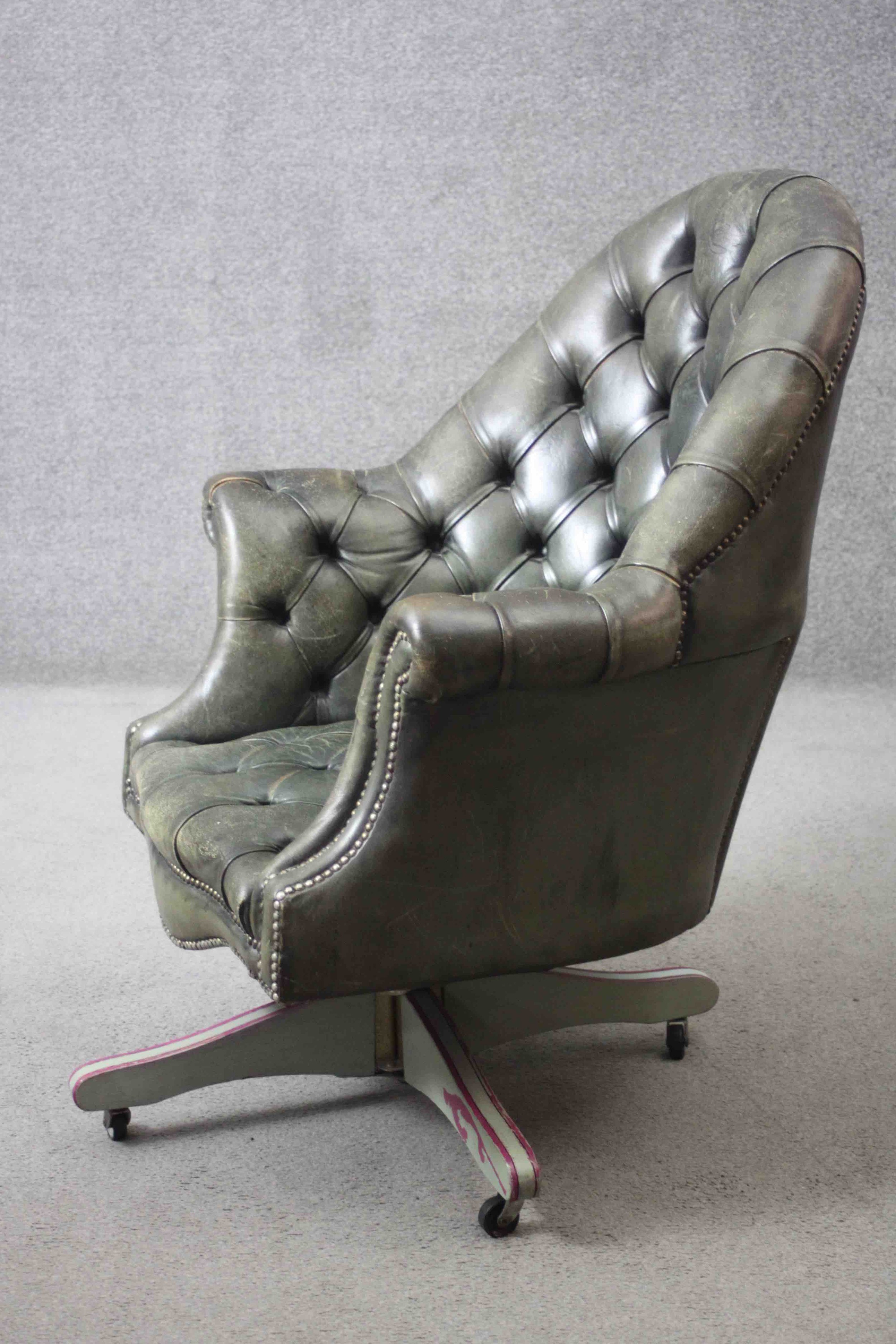 A tub shaped library armchair or desk chair in deep buttoned leather upholstery with tilt and swivel - Image 4 of 6