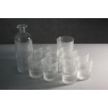 A set of eleven Baccarat Nancy hand cut crystal whisky tumblers with abstract square design. Along