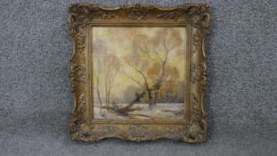 After Harry William Adams- A gilt framed oil on board of an evening winter landscape. Unsigned and