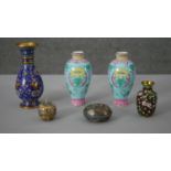 A collection of Chinese enamel pieces. Including a pair of Canton enamel vases decorated with