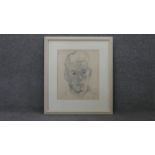 Terence Howe (B.1943) a framed and glazed pencil self portrait on paper, signed with inscription