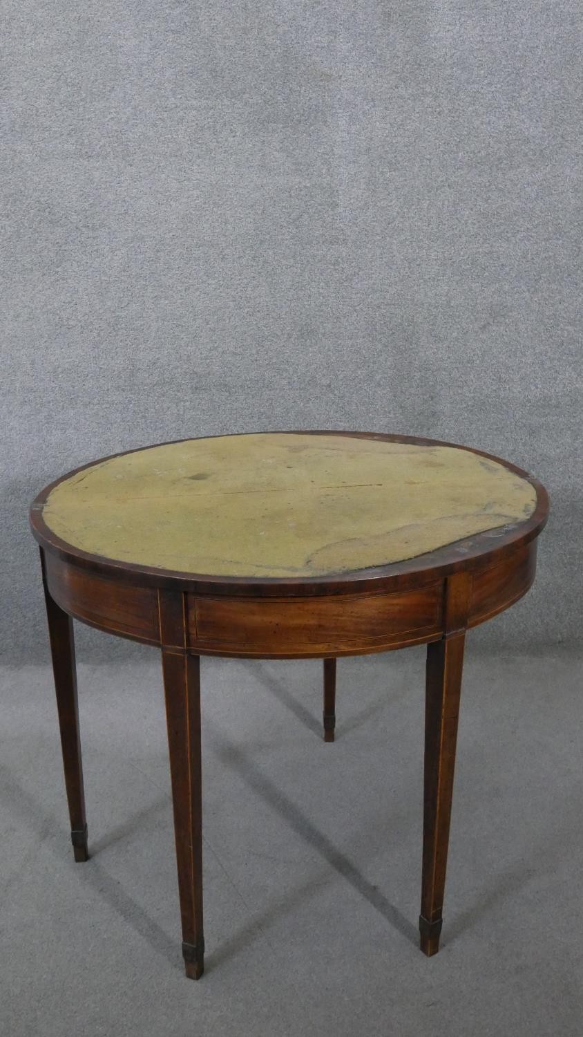 A Georgian mahogany demi lune fold over top card table with satinwood line inlay and gateleg - Image 3 of 4