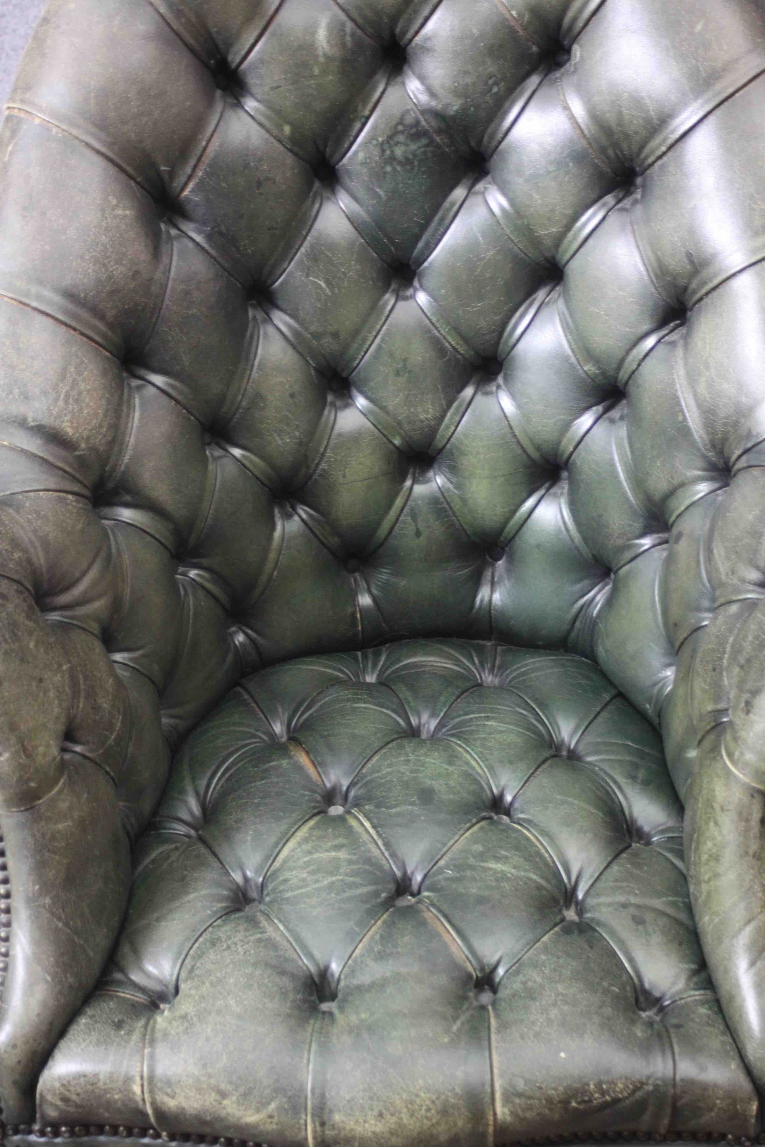 A tub shaped library armchair or desk chair in deep buttoned leather upholstery with tilt and swivel - Image 6 of 6