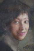 A framed and glazed oil on board, female head and shoulders portrait. Indistinctly signed. H.47 W.